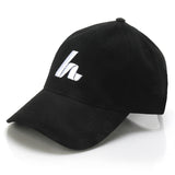 The Hat Trick Lid Hats Howies Hockey Tape Black