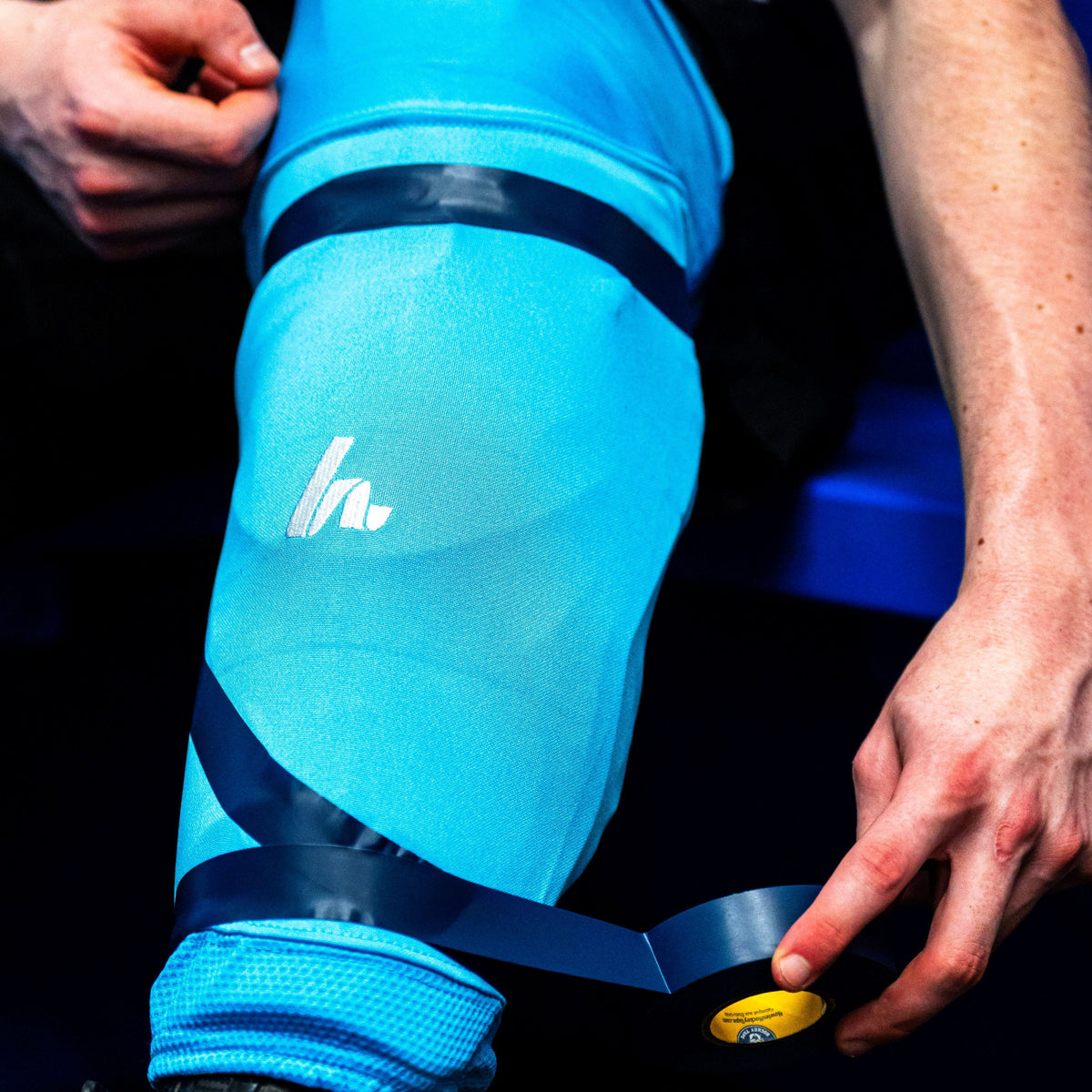 Royal Blue Shin Pad Tape on Light Blue Sock 