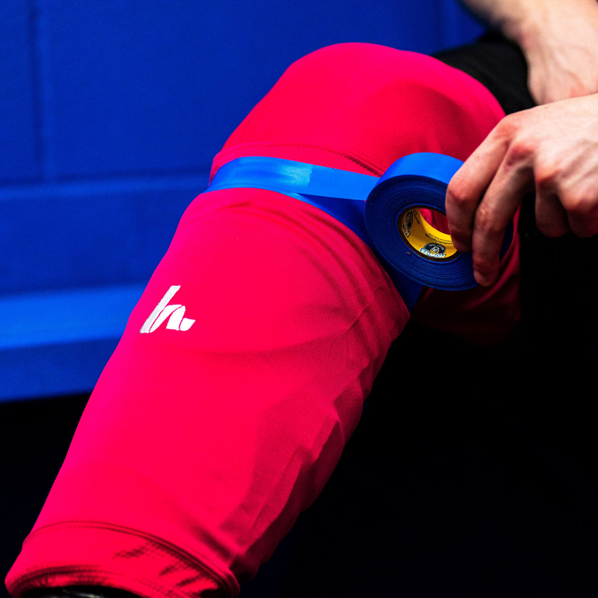 Royal Blue Shin Pad tape on pink sock
