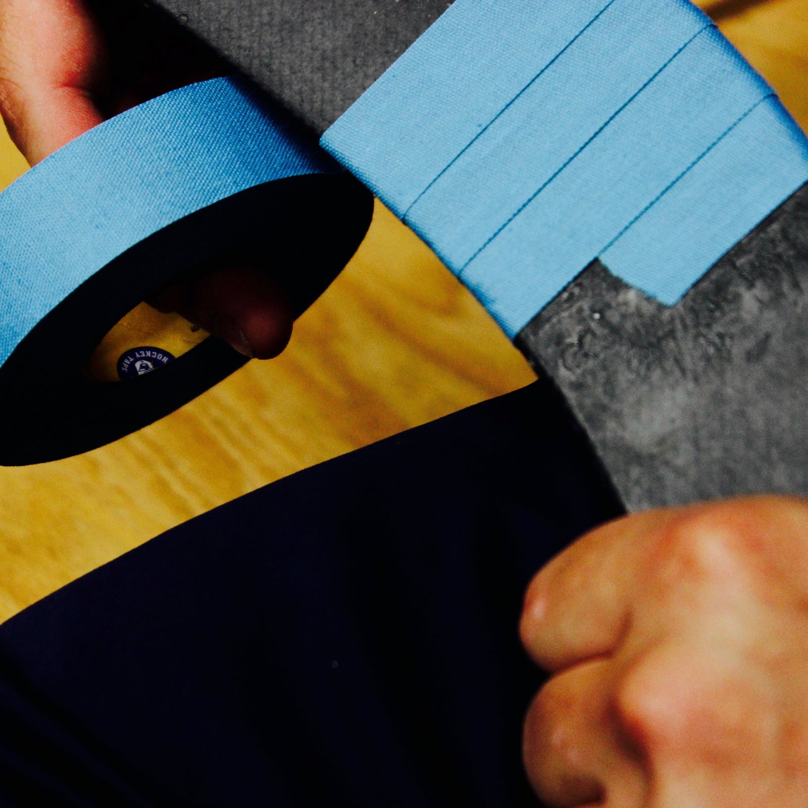 sky blue hockey tape on a stick 